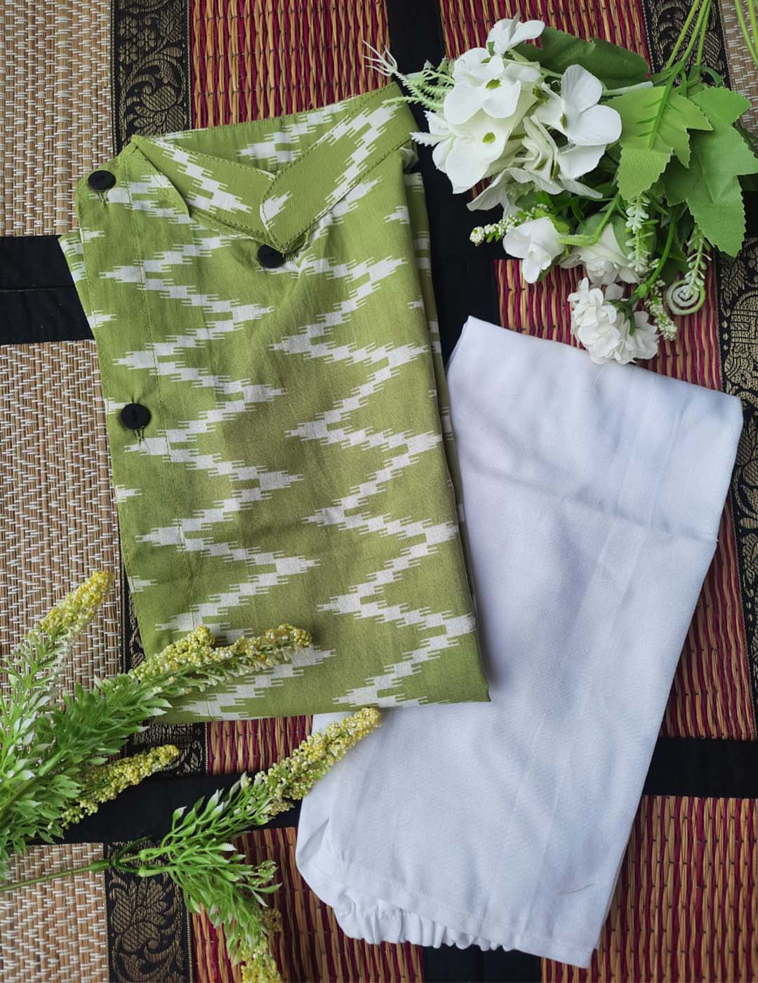 Green Kurta Styled With Side Buttons And White Pyjama Krimakay